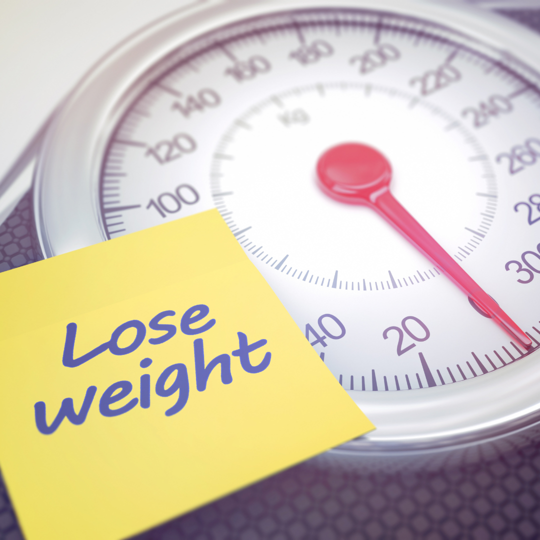 lose weight sign with scale