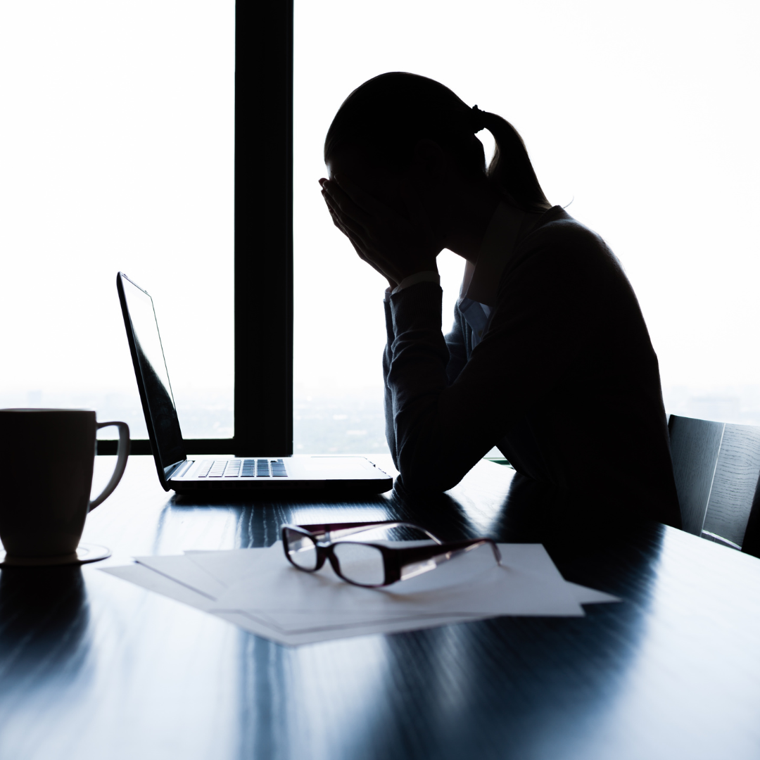 stressed out woman at desk