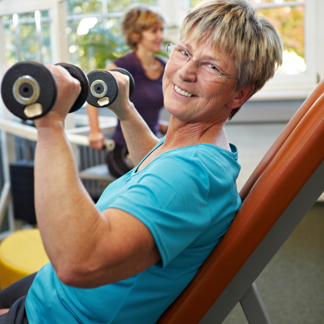 woman doing a dumbbell chest press