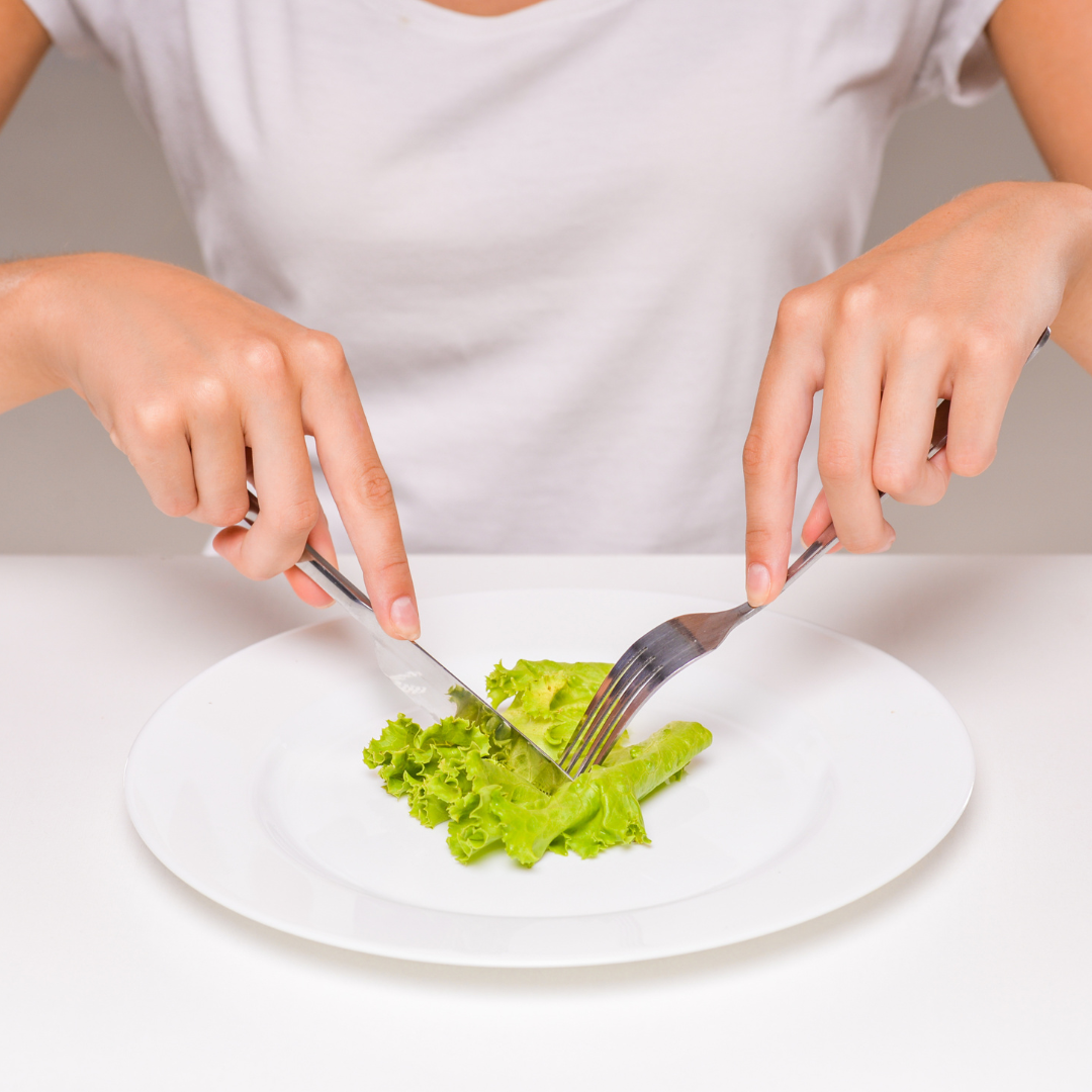 woman eating lettuce