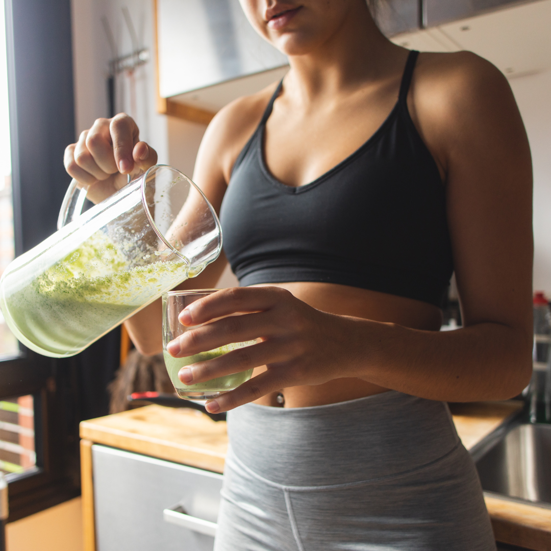 woman pouring a healthy drink